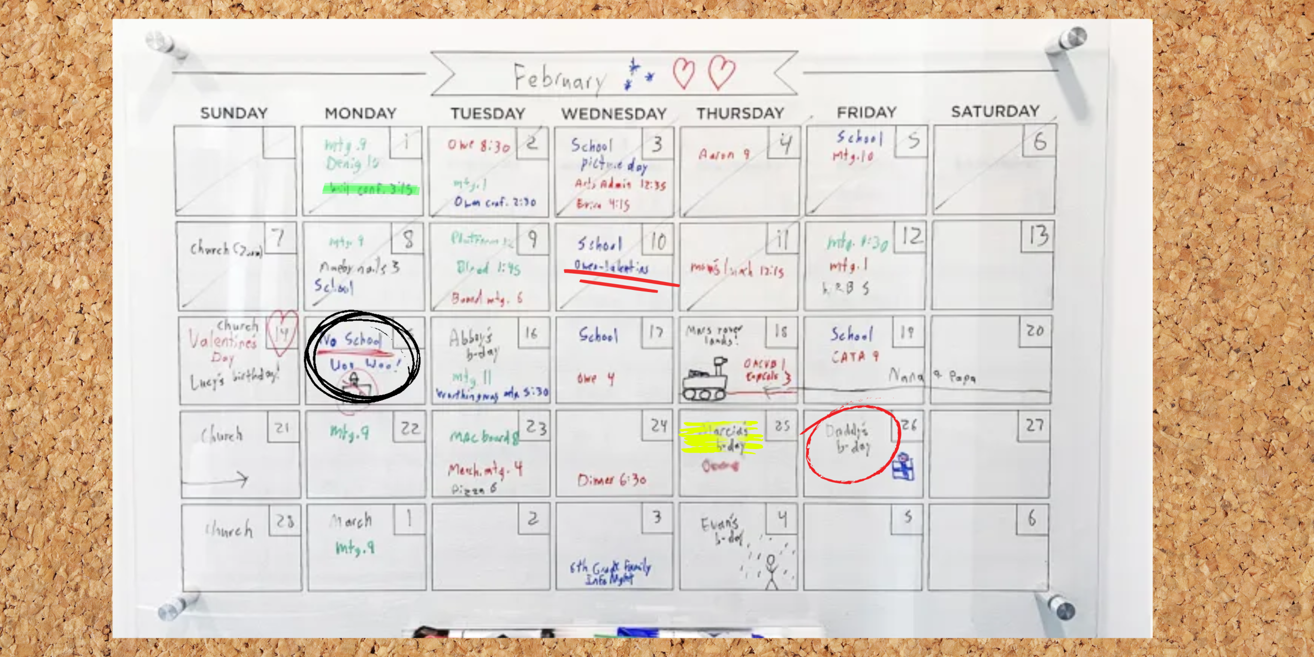Monthly family calendar on a pinboard with handwritten notes, highlights and reminders